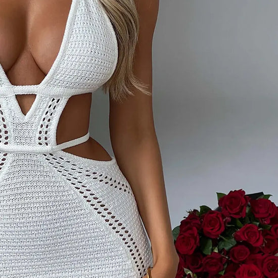 Halter Mini Dress Introducing our Crochet Halter Mini Dress - a stunning blend of elegance and bohemian charm. Handcrafted with intricate crochet details, this dress offers a flattering silhouette and comfortable fit. Made from breathable cotton yarn, it'