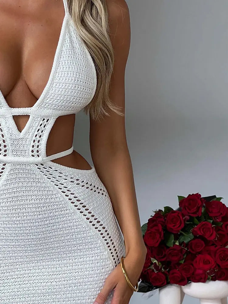 Halter Mini Dress Introducing our Crochet Halter Mini Dress - a stunning blend of elegance and bohemian charm. Handcrafted with intricate crochet details, this dress offers a flattering silhouette and comfortable fit. Made from breathable cotton yarn, it'