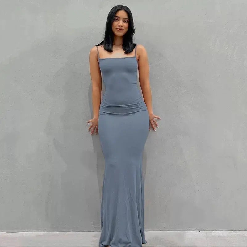 Sleeveless Backless Maxi Bodycon Dress Be daring and bold in our Sleeveless Backless Maxi Bodycon Dress. This showstopping piece is perfect for making a statement and inspiring confidence. Let yourself shine with this captivating design! SPECIFICATIONS Ma