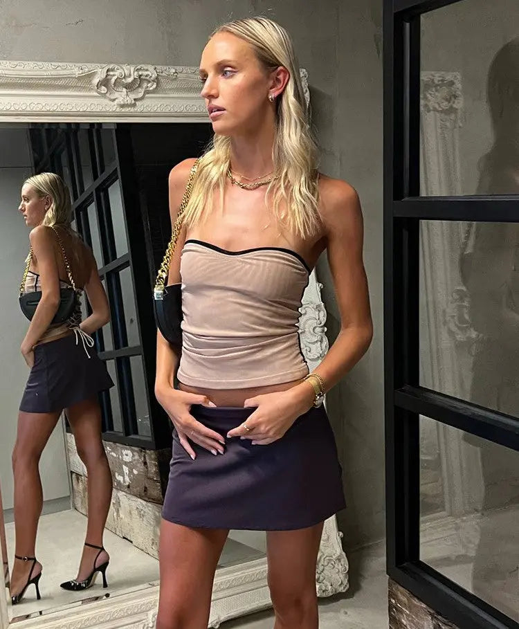 Sleeveless Mesh Crop Top The future is looking bright Who says you can't bring in the new year with a little bit of edge? This sleeveless mesh crop top is perfect for any party. The sleeveless Mesh Crop Top comes in a variety of colors to match any outfit