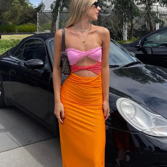 Clementine Dress The Clementine Dress is perfect for any special occasion! This dress is made from a stretchy fabric that hugs your curves in all the right places, making it look and feel amazing. The dress looks fun and chic at the same time, and the str